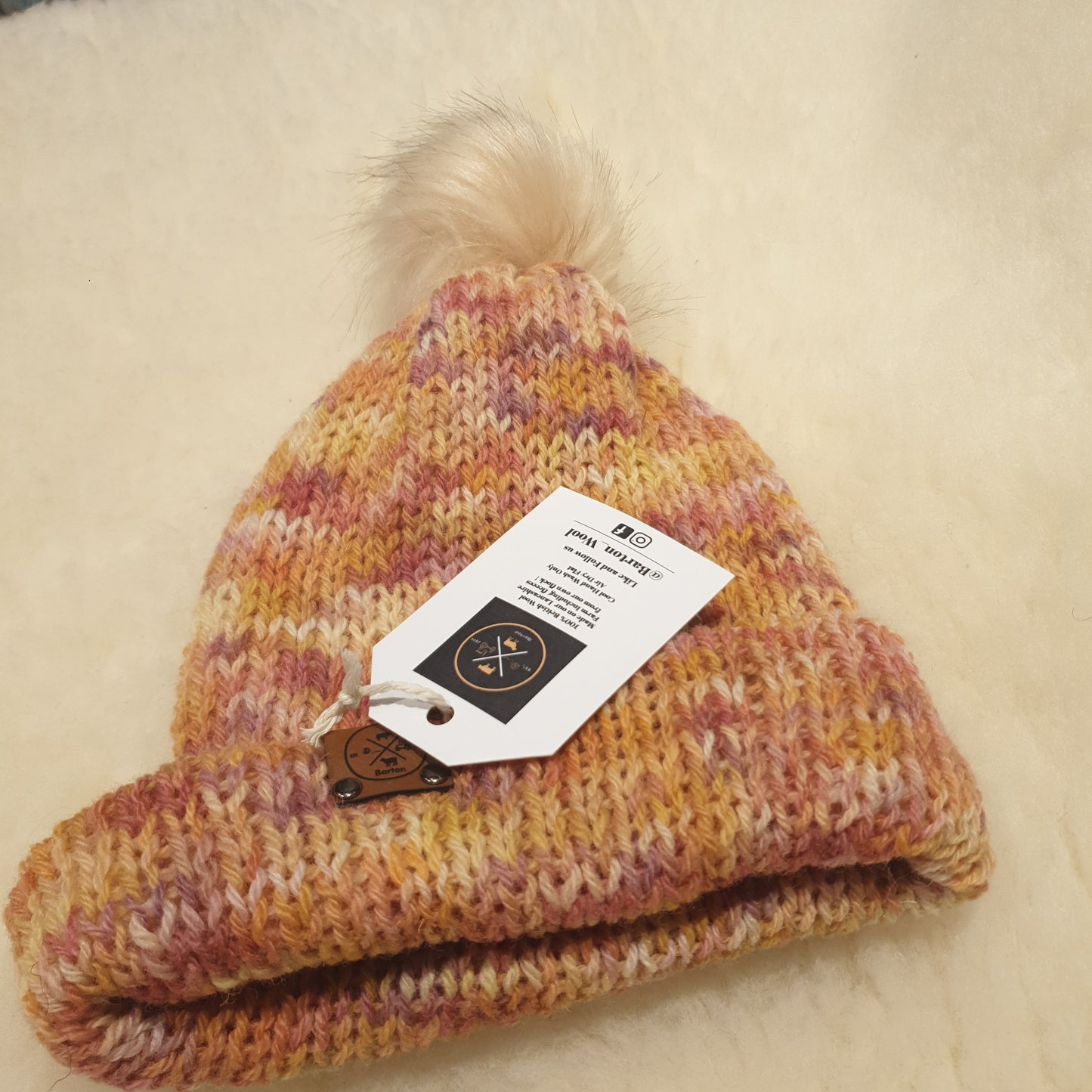 Small bobble hat