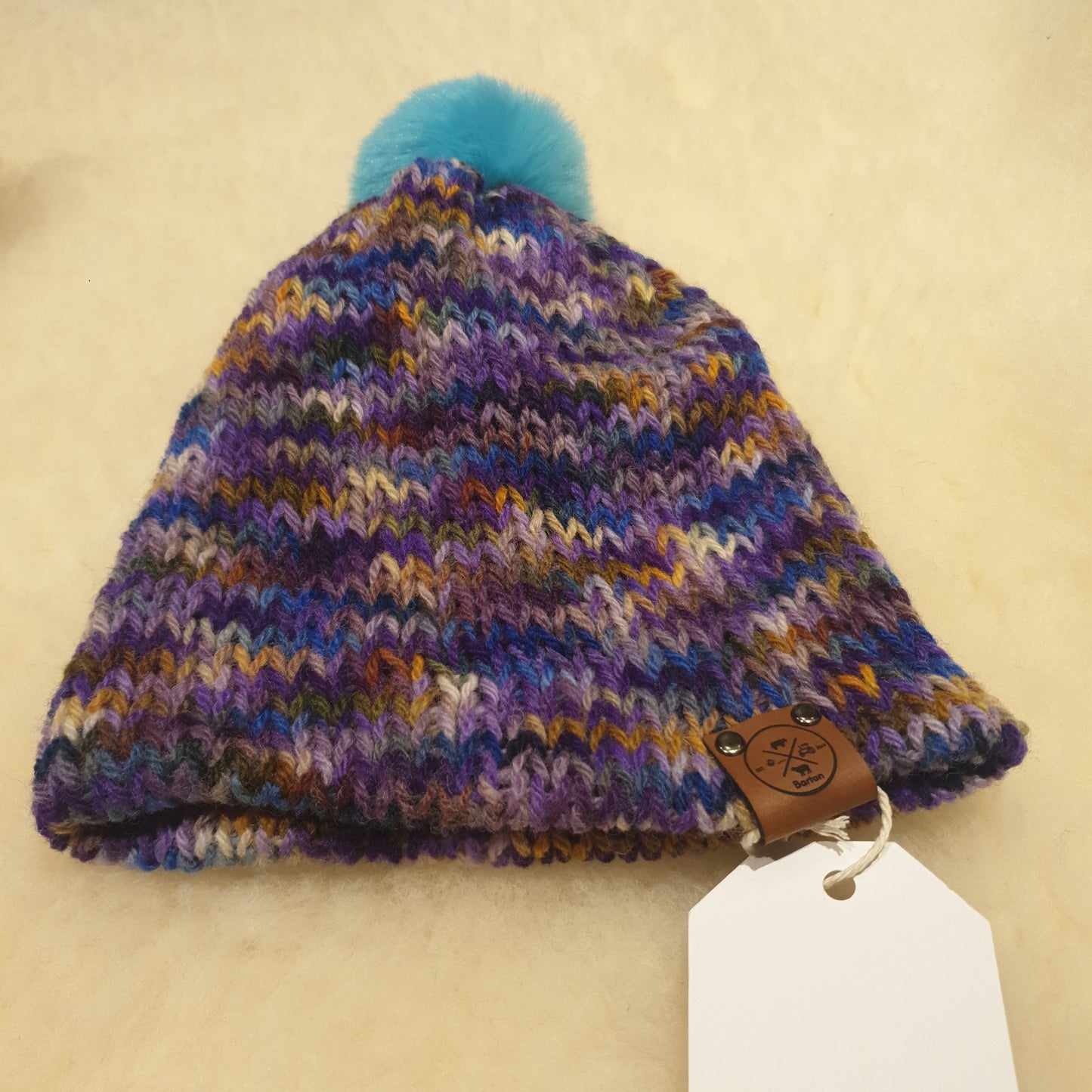 Small bobble hat