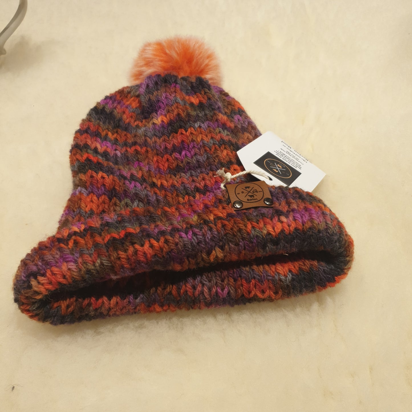 Small bobble hat