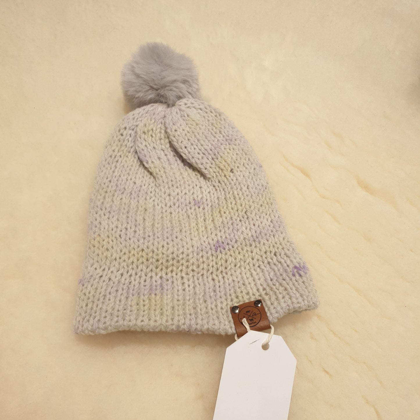 Small bobble hat