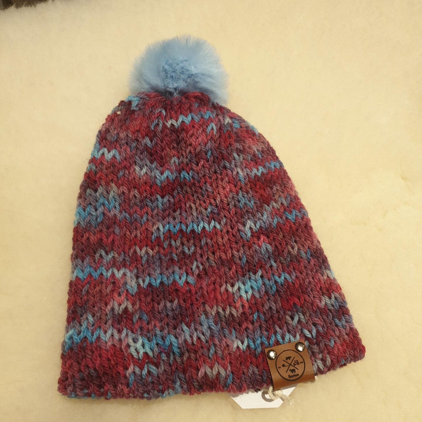 Small bobble hat