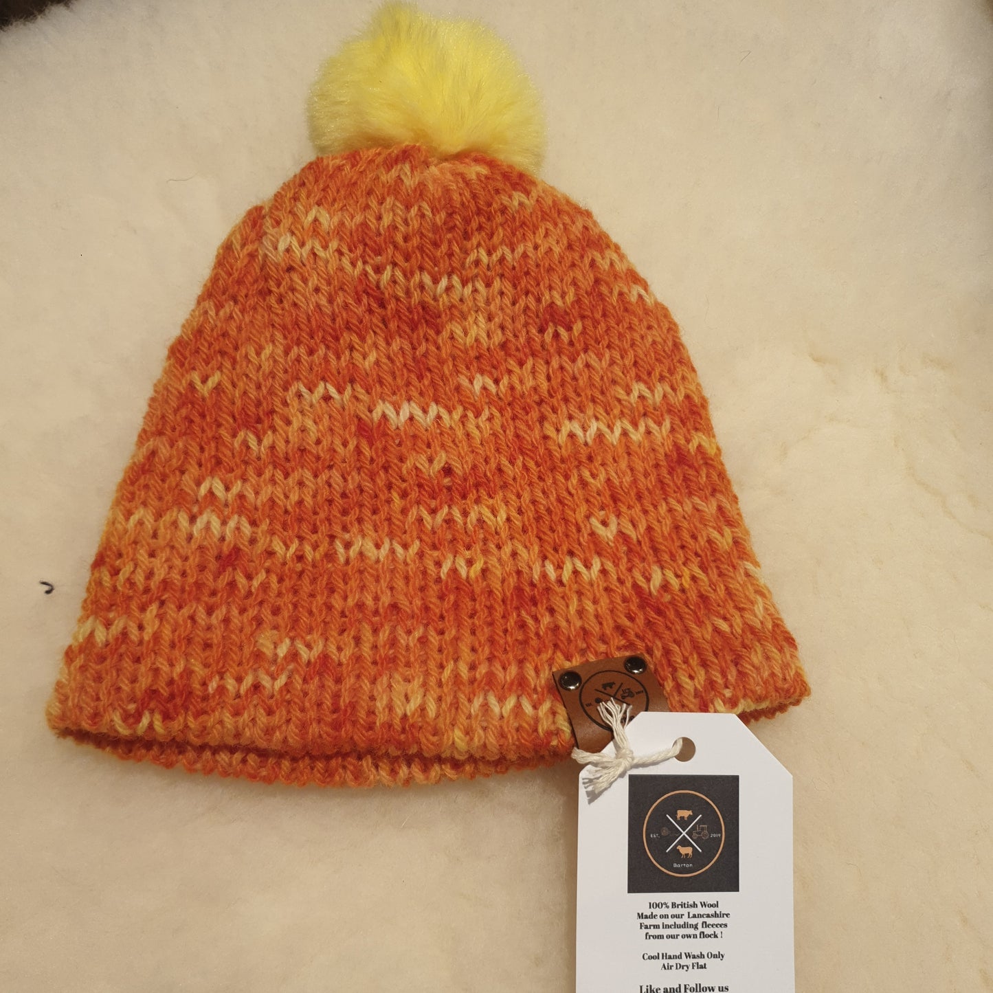 Small bobble hat